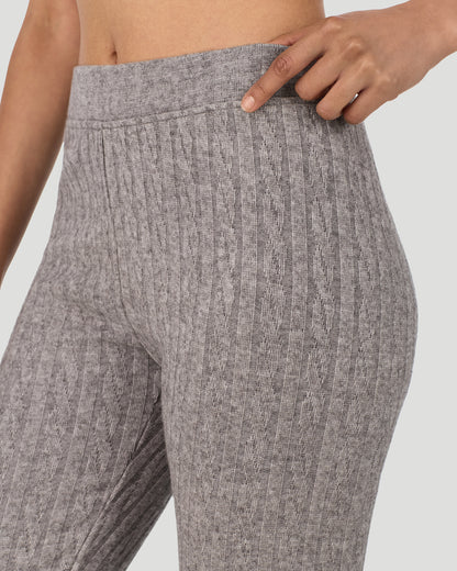 A lady wearing Light Grey Heather Cable Knit Legging in a front view detail close up look