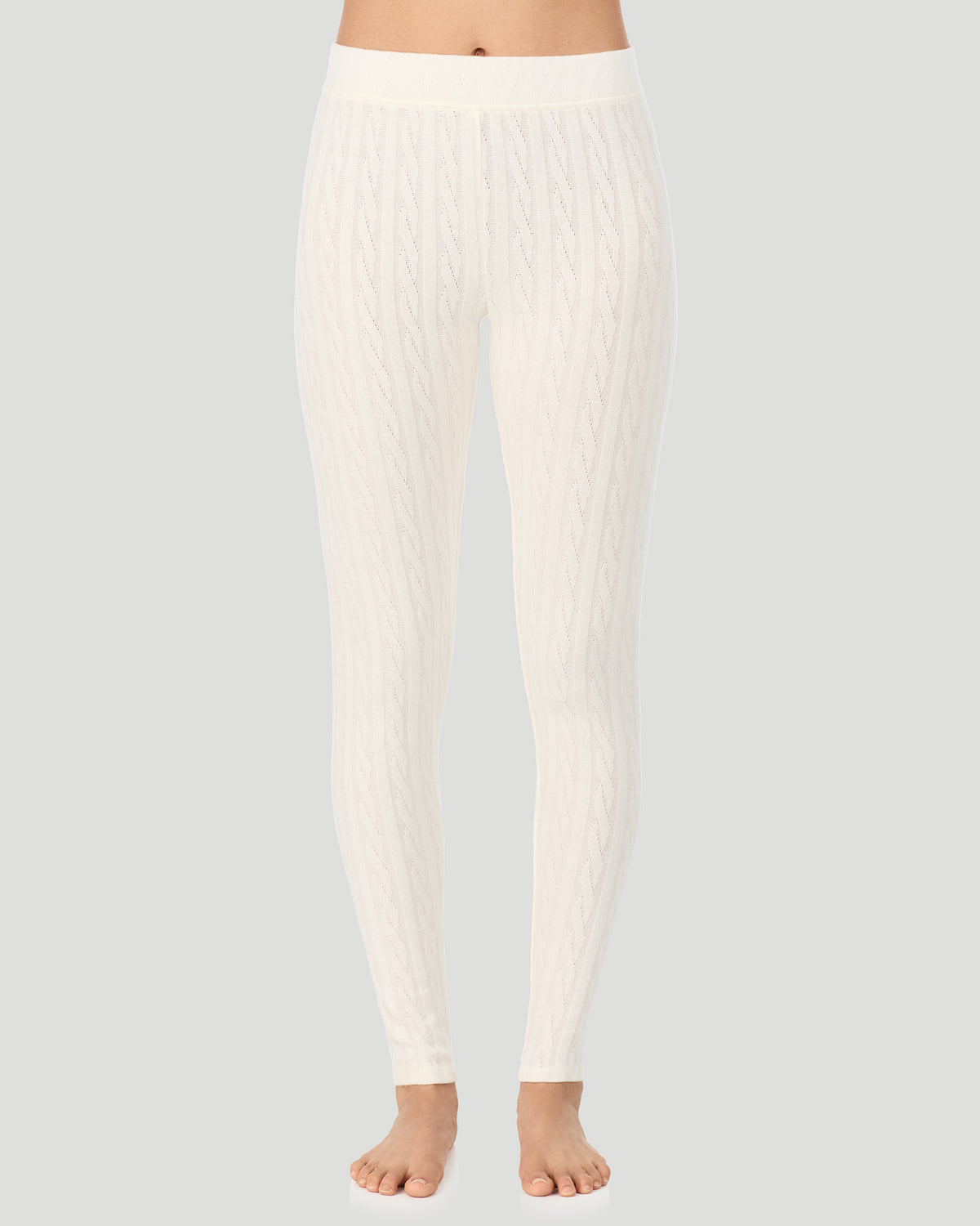 Vanilla Ice; Model is wearing a size S. She is 5’10”, Bust 33.5”, Waist 25”, Hips 36”. @A lady wearing Vanilla Ice Cable Knit Legging in a front view pose
