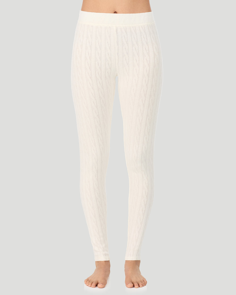 A lady wearing Vanilla Ice Cable Knit Legging in a front view pose