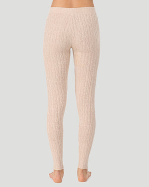 A lady wearing Oatmeal Heather Cable Knit Legging in a back view pose