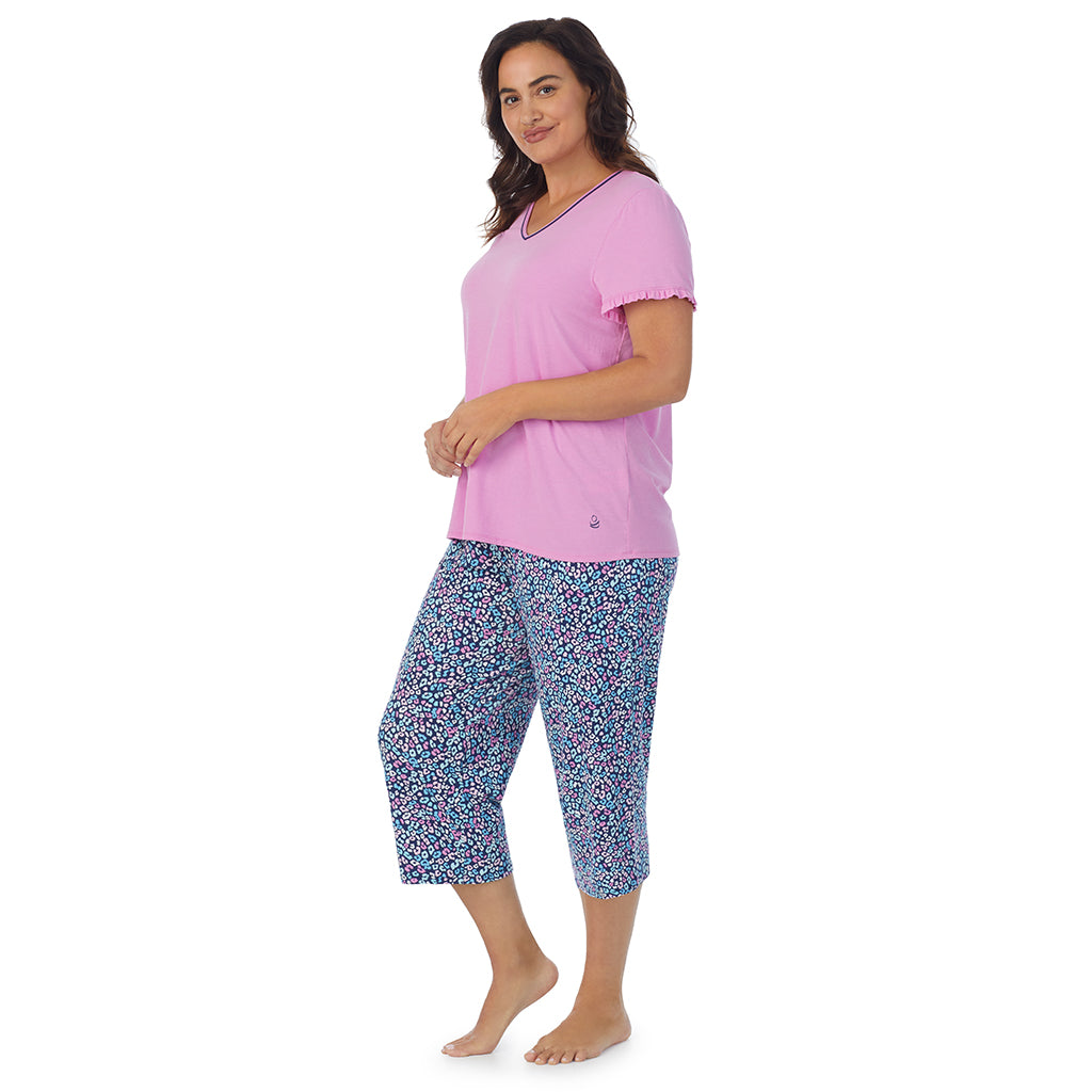 Multi Animal;Model is wearing size 1X. She is 5'11.5", Bust 41", Waist 33", Hips 46"@A lady wearing short sleeve top with cropped pant pajama set with multi animal print