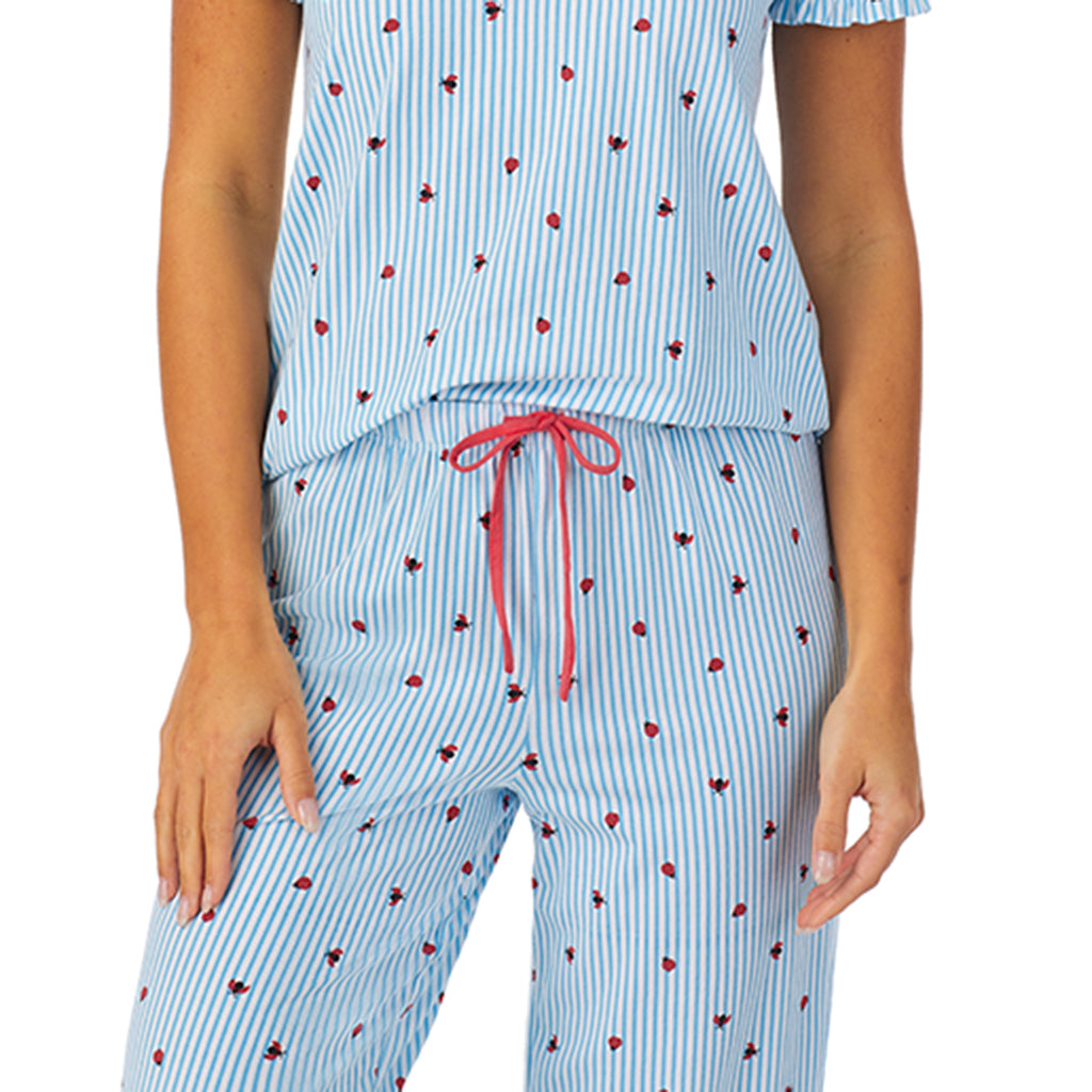 Ladybug Stripe; Model is wearing size S. She is 5'8.5", Bust 32", Waist 25", Hips 36". @A lady wearing short sleeve top with cropped pant pajama set with blue stripes and ladybug print