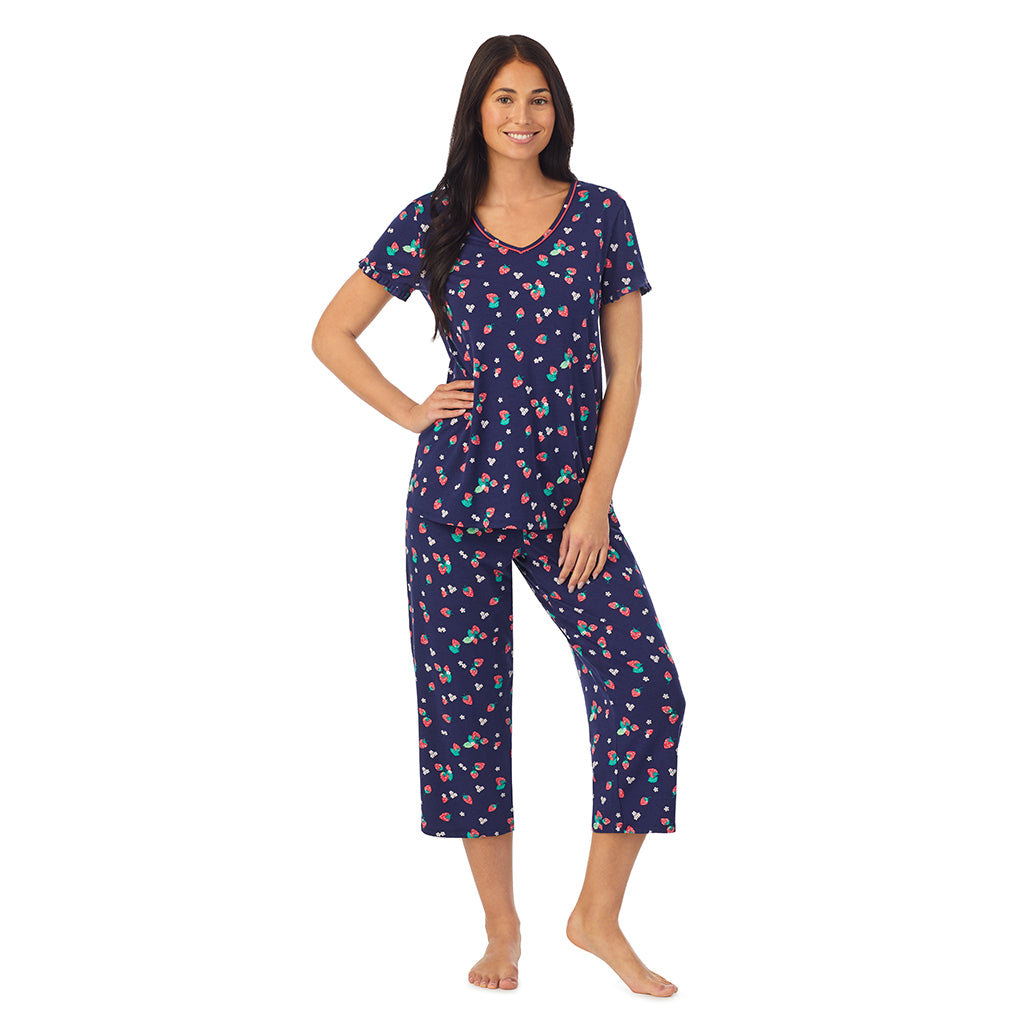 Strawberry Field; Model is wearing size S. She is 5'8.5", Bust 32", Waist 25", Hips 36". @A lady wearing short sleeve top with cropped pant pajama set with Strawberry Field print