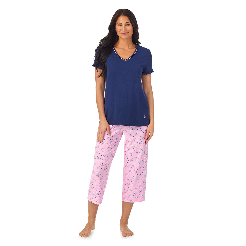 Pink Dragonfly; Model is wearing size S. She is 5'8.5", Bust 32", Waist 25", Hips 36". @A lady wearing blue short sleeve top with pink cropped pant pajama set with Pink Dragonfly print
