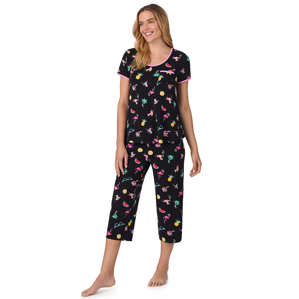 Summer Graphic;Model is wearing size S. She is 5’10”, Bust 34”, Waist 26", Hips 38”. @ A lady wearing black short sleeve top with cropped pant pajama set with Summer Graphic print