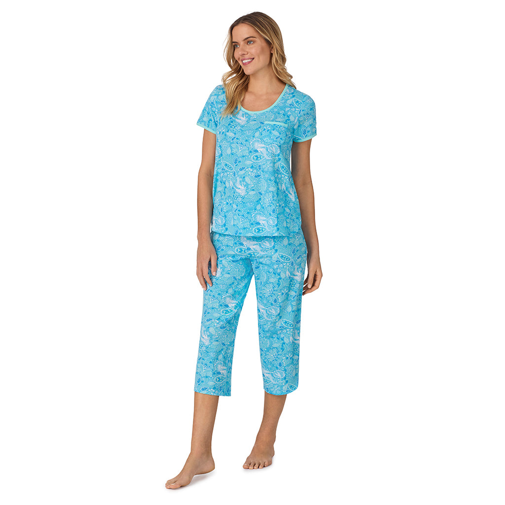Mermaid Floral;Model is wearing size S. She is 5’10”, Bust 34”, Waist 26", Hips 38”. @ A lady wearing blue short sleeve top with cropped pant pajama set with mermaid floral print