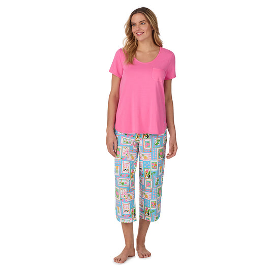  A lady wearing pink short sleeve top with cropped pant pajama set with summer frames print