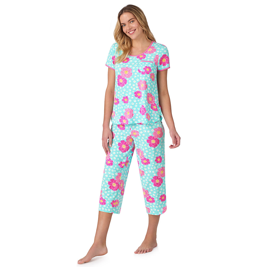 Aqua Multi Floral;Model is wearing size S. She is 5’10”, Bust 34”, Waist 26", Hips 38”. @ A lady wearing blue short sleeve top with cropped pant pajama set with floral print