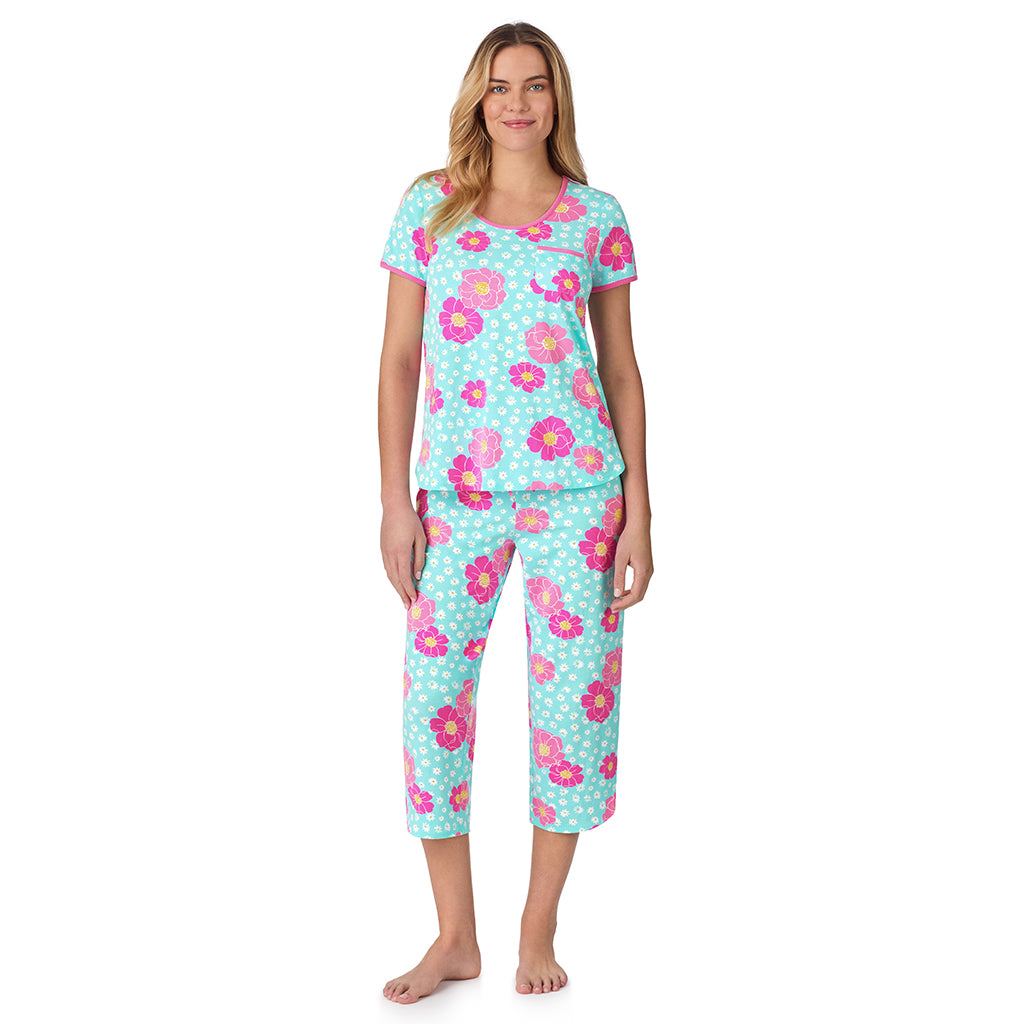 Aqua Multi Floral;Model is wearing size S. She is 5’10”, Bust 34”, Waist 26", Hips 38”. @ A lady wearing blue short sleeve top with cropped pant pajama set with floral  print