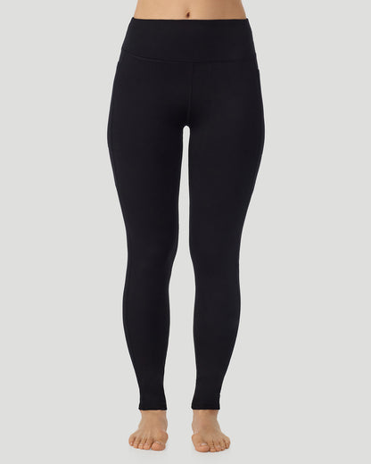 A lady wearing Thermawear Hi-Waisted Legging With Pockets in black shown in a front view pose