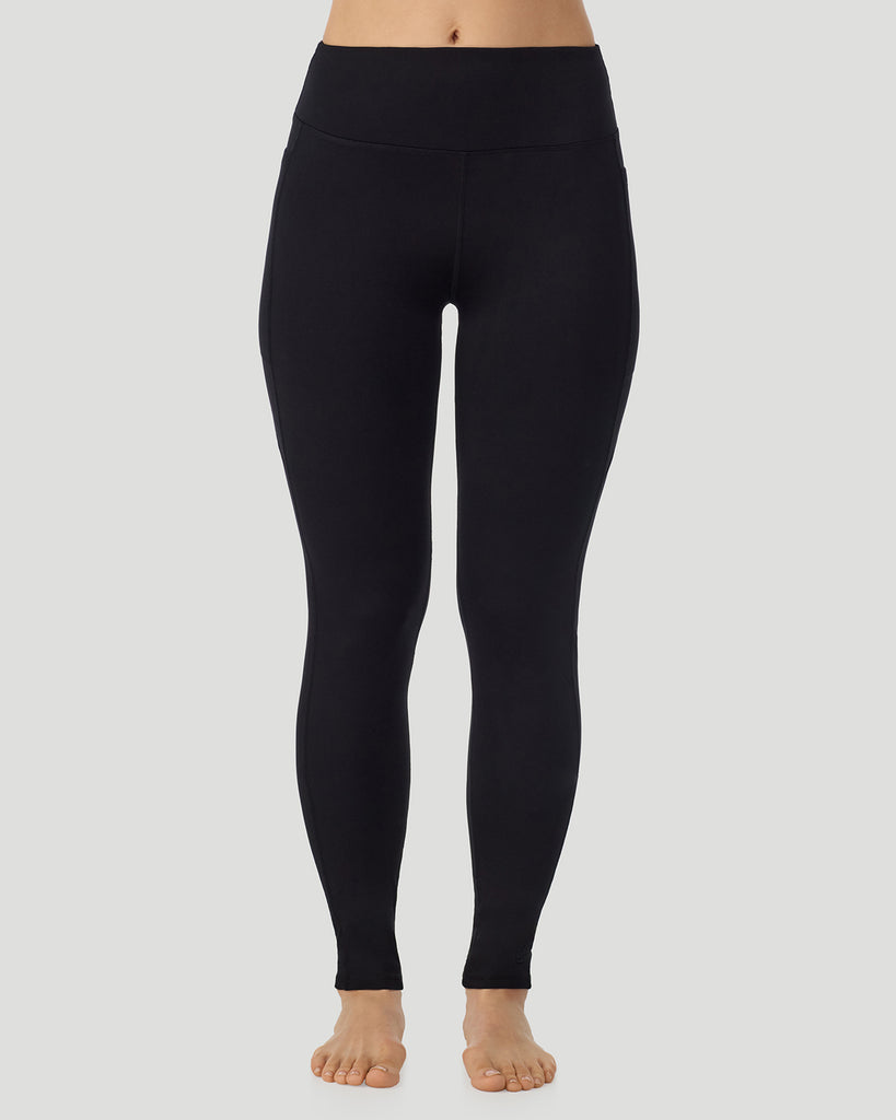 A lady wearing Thermawear Hi-Waisted Legging With Pockets in black shown in a front view pose