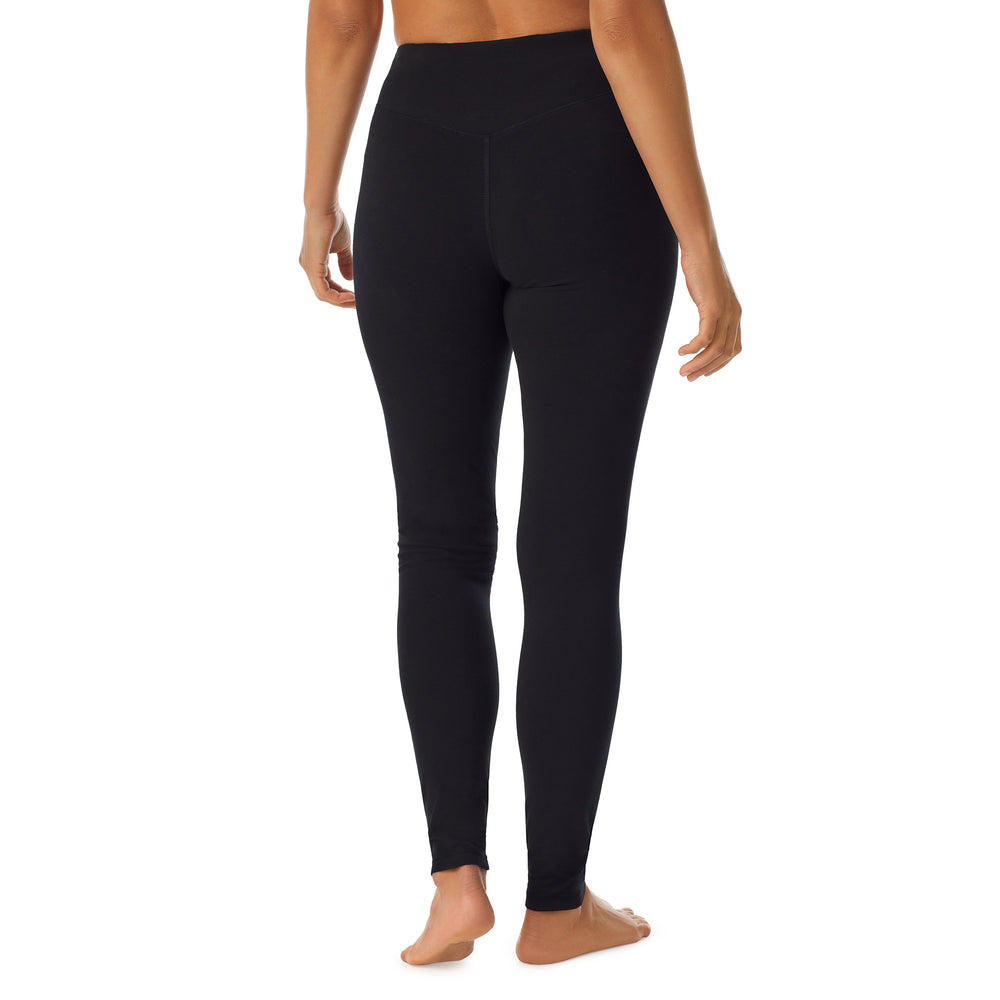 A lady wearing black cottonwear legging