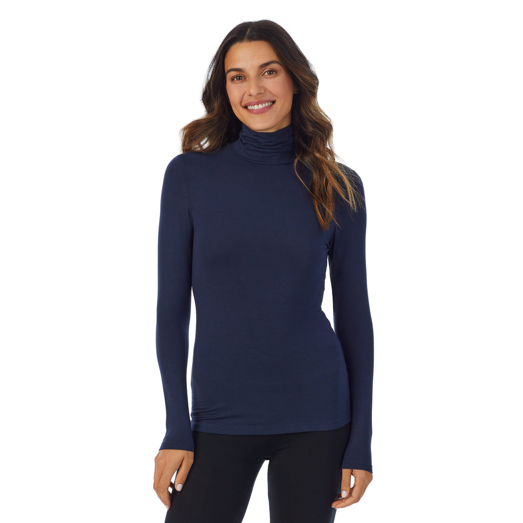A lady wearing Softwear With Stretch Long Sleeve Turtleneck in Navy Blazer back view back view
