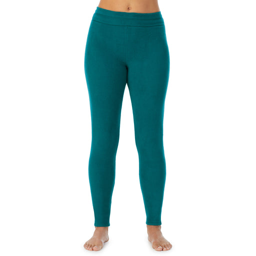 Teal Lagoon; Model is wearing size S. She is 5’8”, Bust 34”, Waist 24.5”, Hips 35”.@A lady wearing teal lagoon fleecewear with stretch legging.