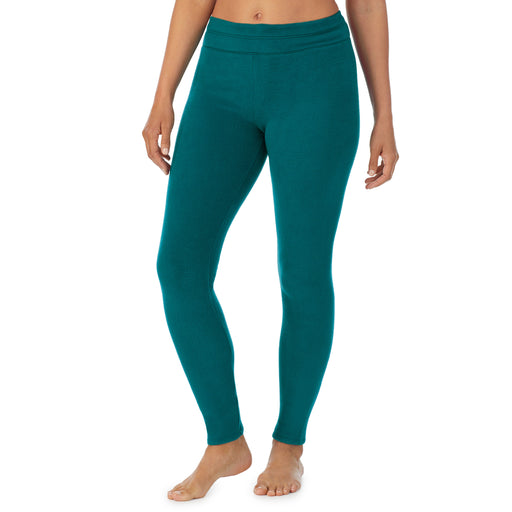 Teal Lagoon; Model is wearing size S. She is 5’8”, Bust 34”, Waist 24.5”, Hips 35”.@A lady wearing Teal lagoon fleecewear with stretch legging.