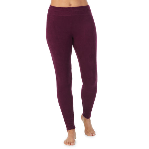 Purple Beet; Model is wearing size S. She is 5’8”, Bust 34”, Waist 24.5”, Hips 35”.@A lady wearing purple beet fleecewear with stretch legging.