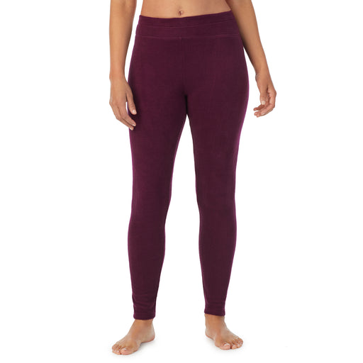 Purple Beet; Model is wearing size S. She is 5’8”, Bust 34”, Waist 24.5”, Hips 35”.@A lady wearing purple beet fleecewear with stretch legging.