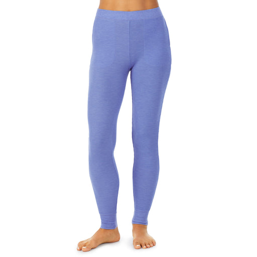 Ultramarine Heather; Model is wearing size S. She is 5’9”, Bust 34”, Waist 25.5”, Hips 36.5”. @A lady wearing a Ultramarine Heather legging.