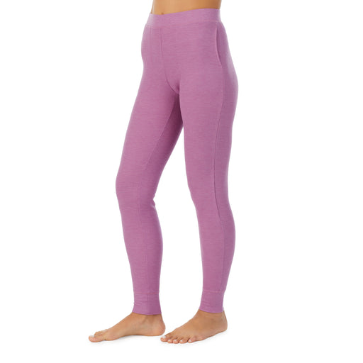Mulberry Mist Heather; Model is wearing size S. She is 5’9”, Bust 34”, Waist 25.5”, Hips 36.5”. @A lady wearing a Mulberry Mist Heather legging.