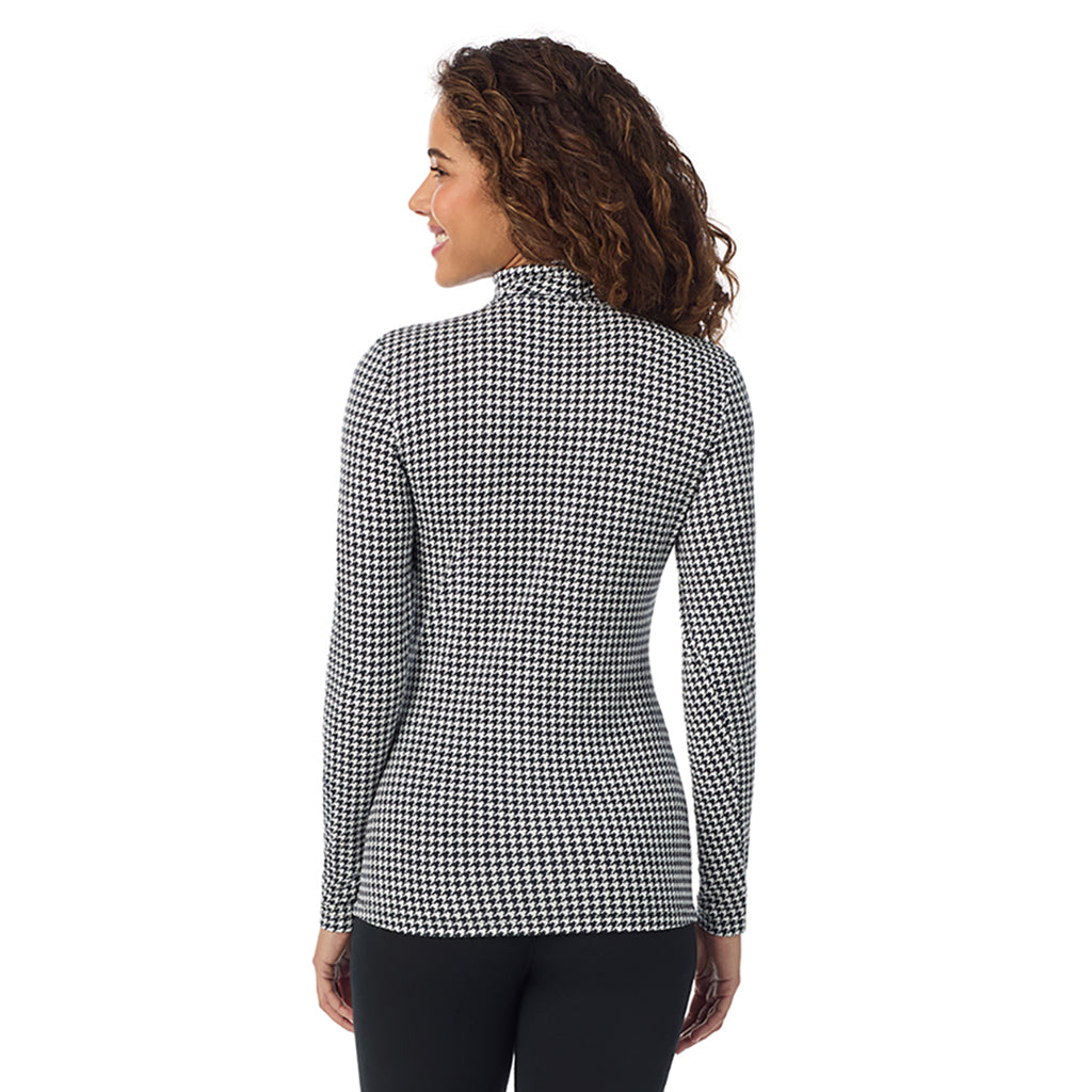 Ivory Houndstooth; Model is wearing size S. She is 5’9”, Bust 34”, Waist 23”, Hips 35”.@A lady wearing ultramarine long sleeve ivory houndstooth softwear with stretch top.