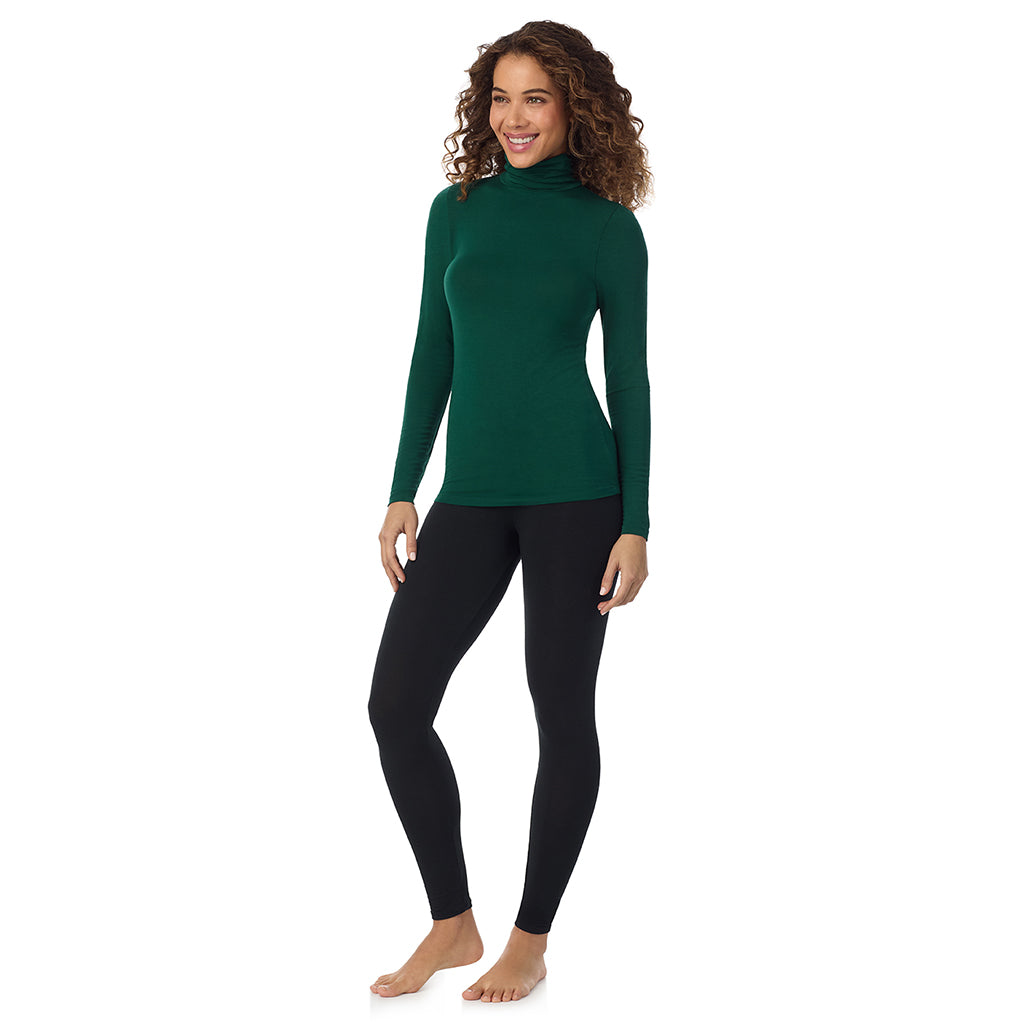 Evergreen; Model is wearing size S. She is 5’9”, Bust 34”, Waist 23”, Hips 35”.@A lady wearing ultramarine long sleeve evergreen softwear with stretch top.