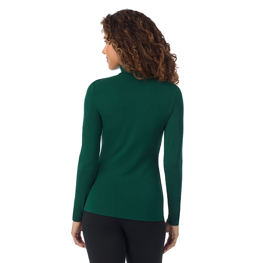 Evergreen; Model is wearing size S. She is 5’9”, Bust 34”, Waist 23”, Hips 35”.@A lady wearing ultramarine long sleeve evergreen softwear with stretch top.