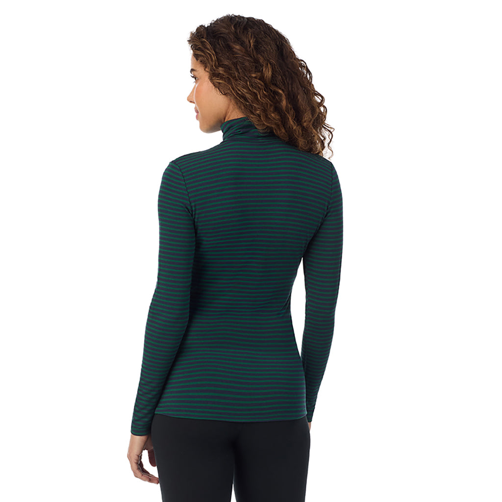 A lady wearing ultramarine long sleeve navy green stripe softwear with stretch top.