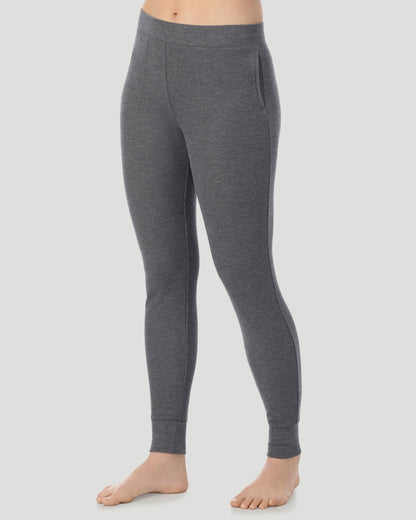A lady wearing Cozy Stretch Thermal Legging in Stone Grey Heather side view side view