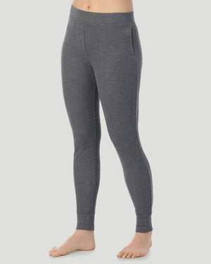 A lady wearing Cozy Stretch Thermal Legging in Stone Grey Heather side view side view