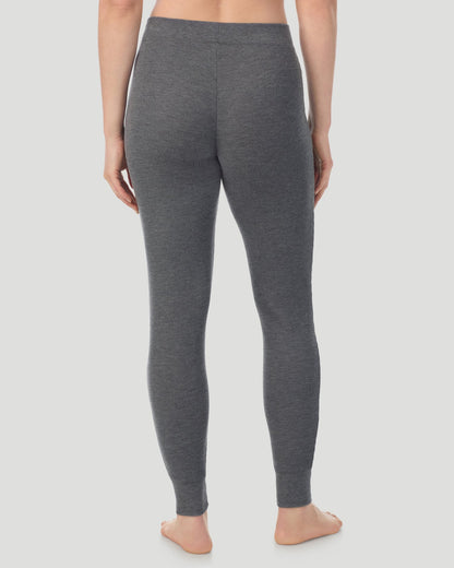 A lady wearing Cozy Stretch Thermal Legging in Stone Grey Heather back view back view