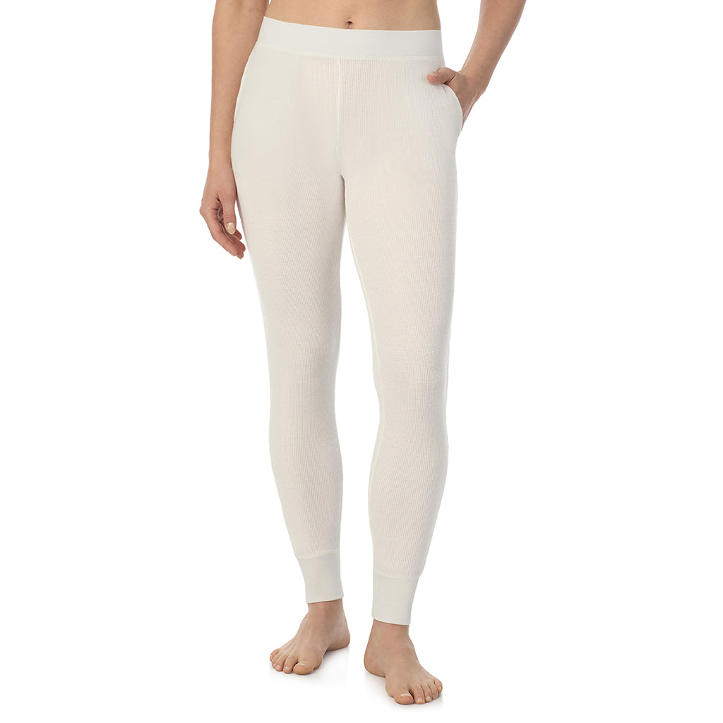 Ivory; Model is wearing a size S. She is 5’9”, Bust 34”, Waist 25”, Hips 36”@ A Lady is wearing Ivory Cozy Stretch Thermal Legging