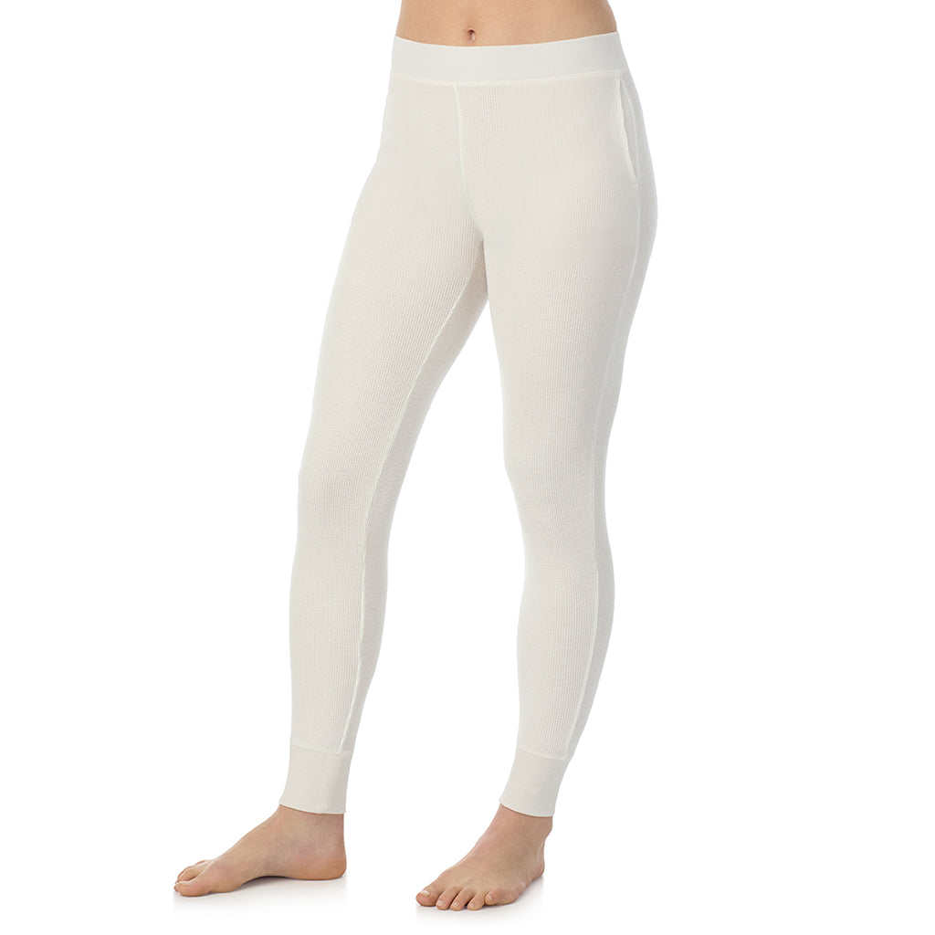 Ivory; Model is wearing a size S. She is 5’9”, Bust 34”, Waist 25”, Hips 36”@ A Lady is wearing Ivory Cozy Stretch Thermal Legging