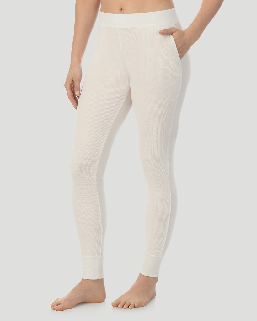 A lady wearing Cozy Stretch Thermal Legging in Ivory close up close up