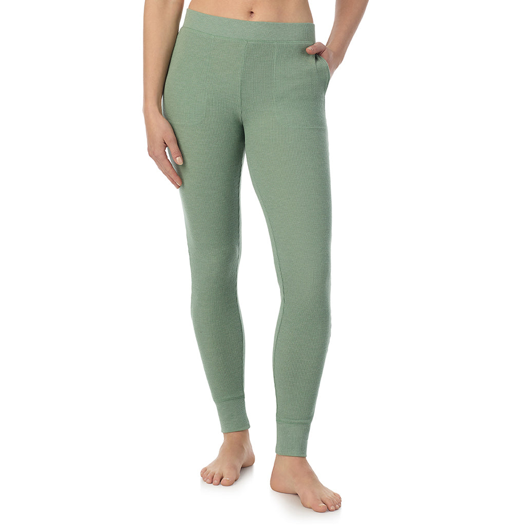  A Lady is wearing Soft Olive Heather Cozy Stretch Thermal Legging