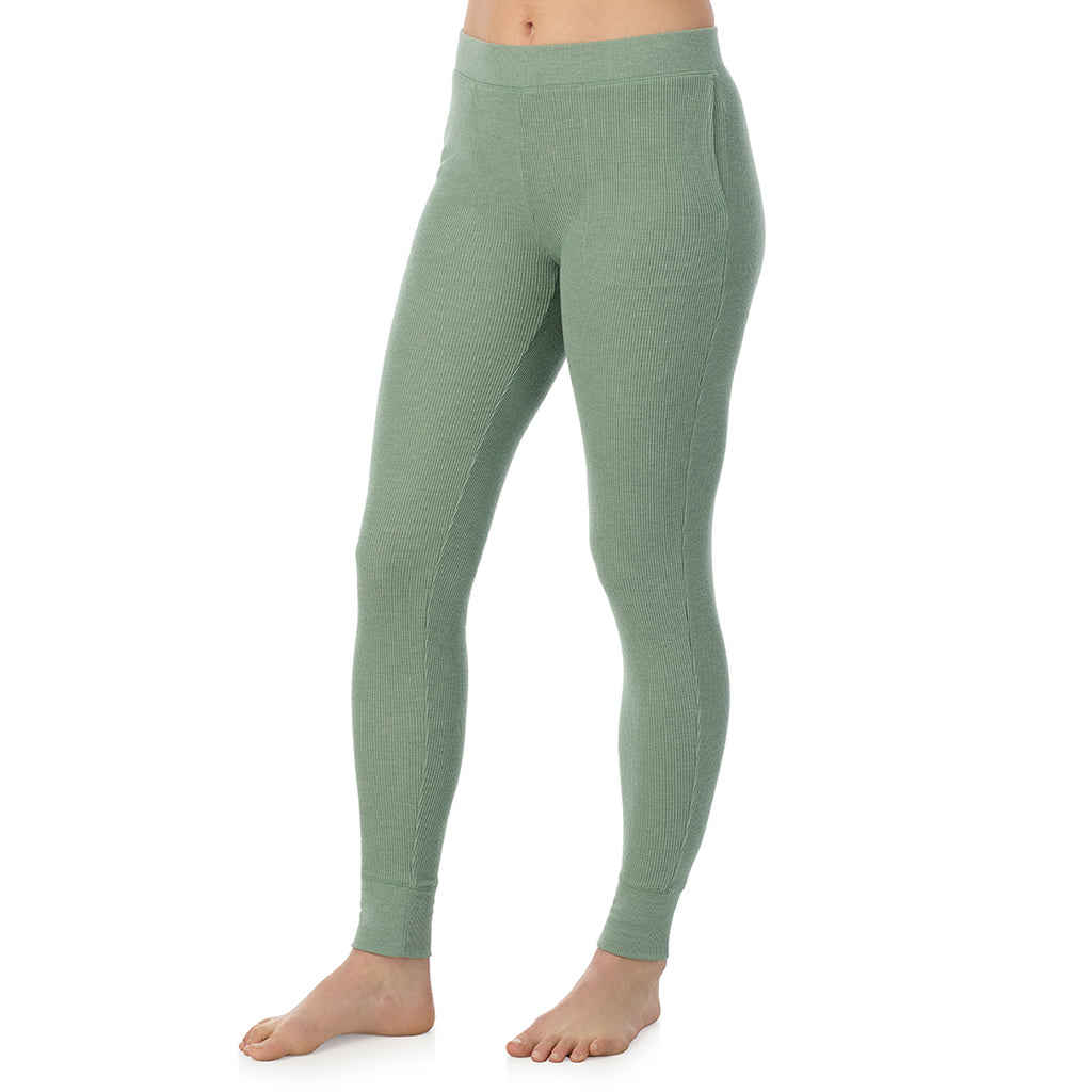  A Lady is wearing Soft Olive Heather Cozy Stretch Thermal Legging