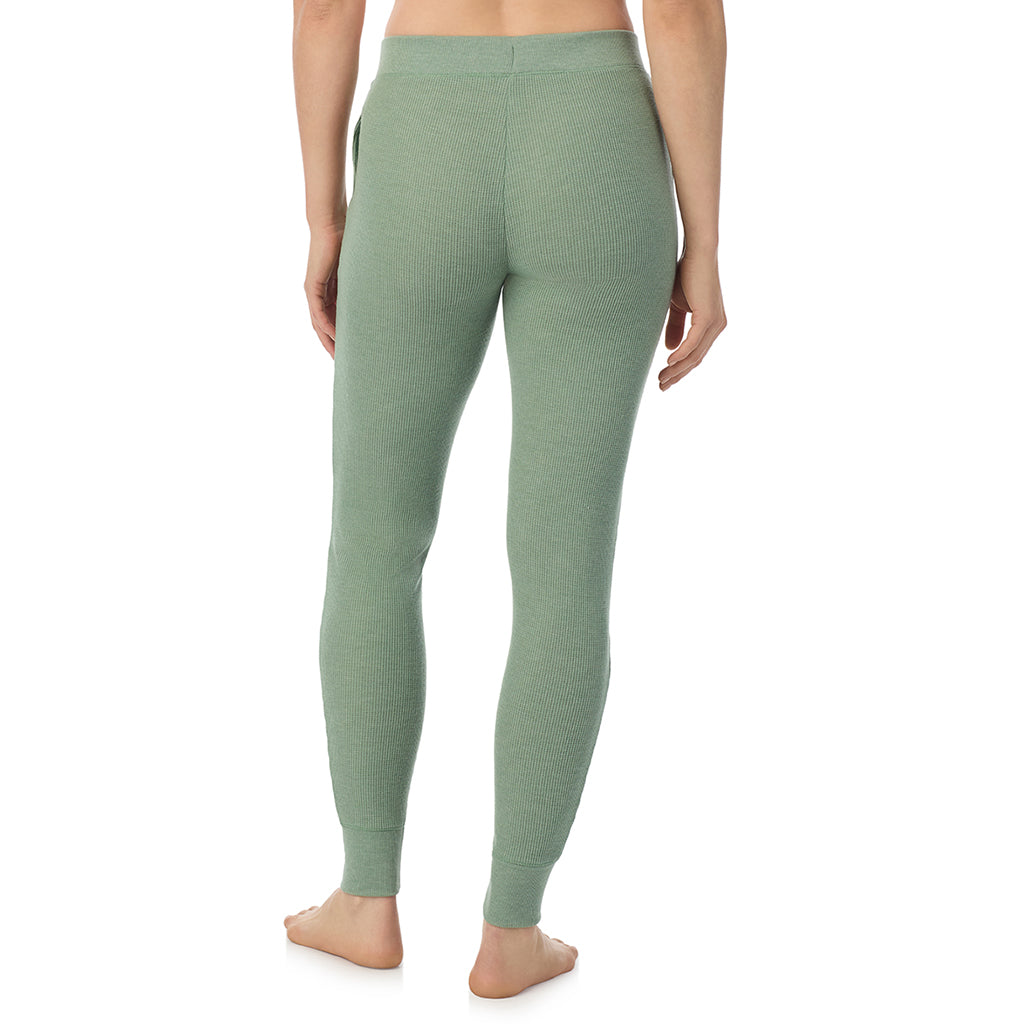  A Lady is wearing Soft Olive Heather Cozy Stretch Thermal Legging