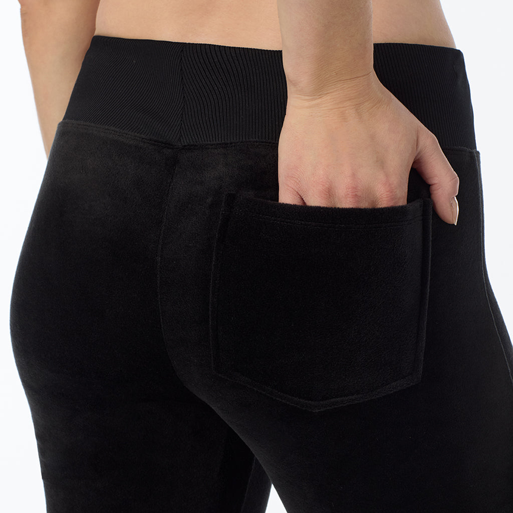  A Lady is wearing Black Stretch Velour Boot Cut Legging