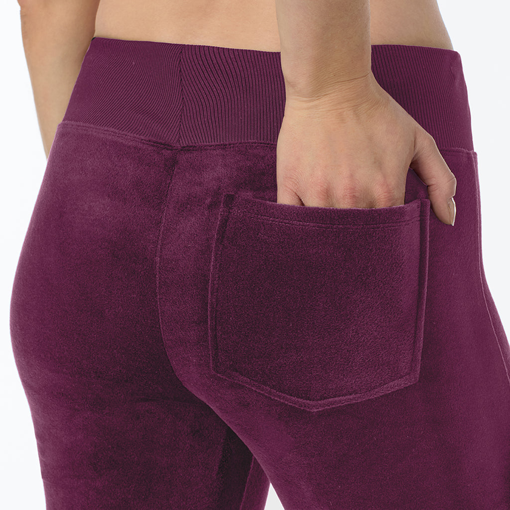 Purple Beet; Model is wearing a size S. She is 5’9”, Bust 34”, Waist 25”, Hips 36”@ A Lady is wearing Purple Beet Stretch Velour Boot Cut Legging