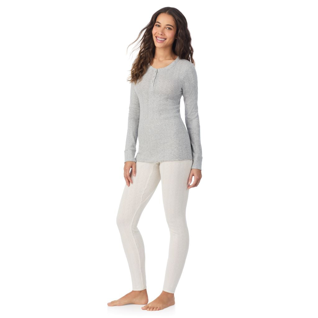 A lady is wearing Cotton Pointelle Long Sleeve Henley

