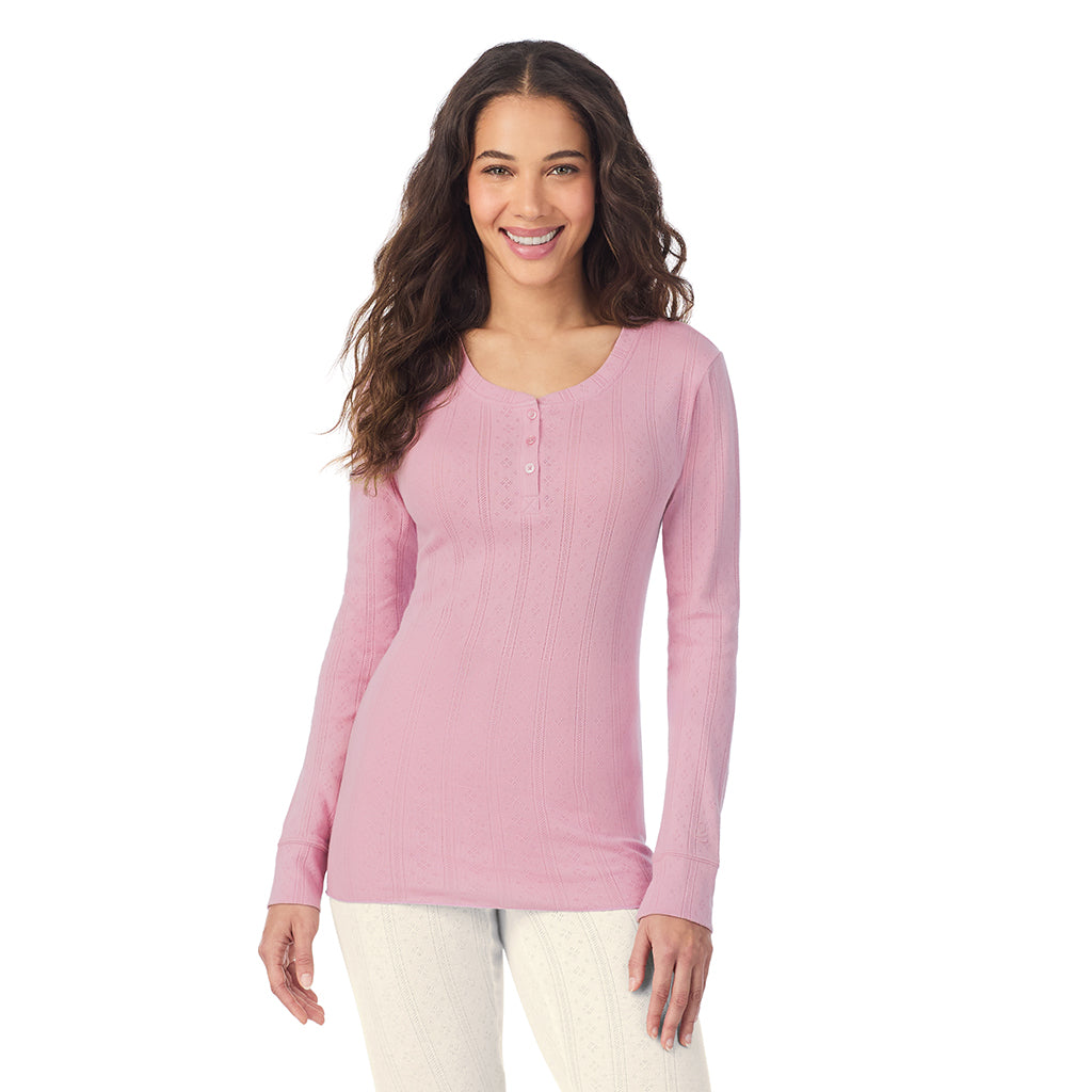A lady is wearing Cotton Pointelle Long Sleeve Henley
