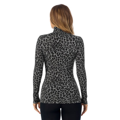 Charcoal Leopard; Model is wearing size S. She is 5'11.5", Bust 34", Waist 26", Hips 37". @A lady wearing charcoal leopard long sleeve turtleneck softwear with stretch top.