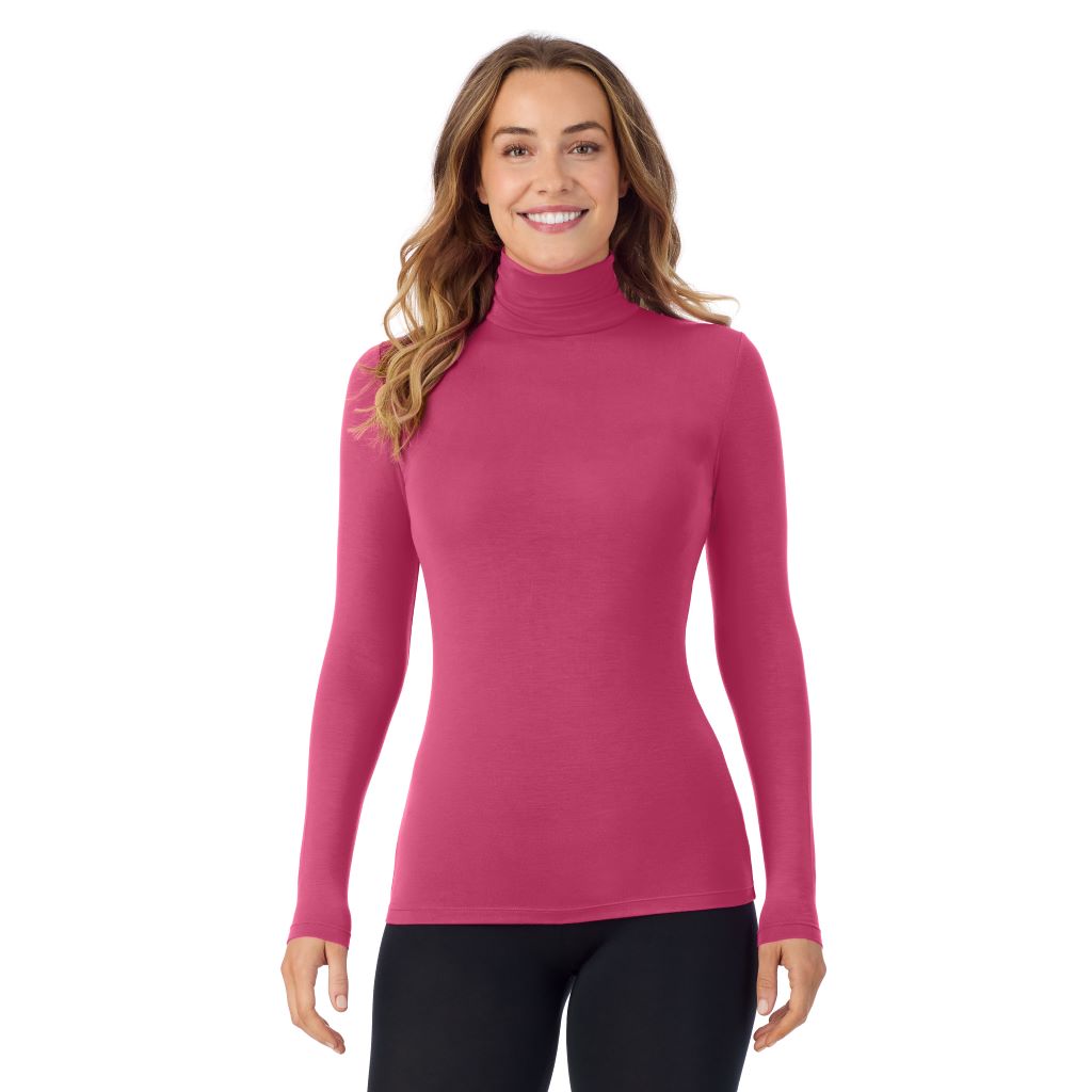 A lady wearing very berry long sleeve turtleneck softwear with stretch top.
