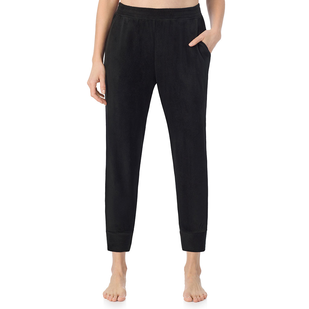 Black; Model is wearing size S. She is 5'11", Bust 33", Waist 24", Hips 34".@A lady wearing Black Cuddl Duds x Jennifer Lake Fleecewear with Stretch Cropped Jogger 