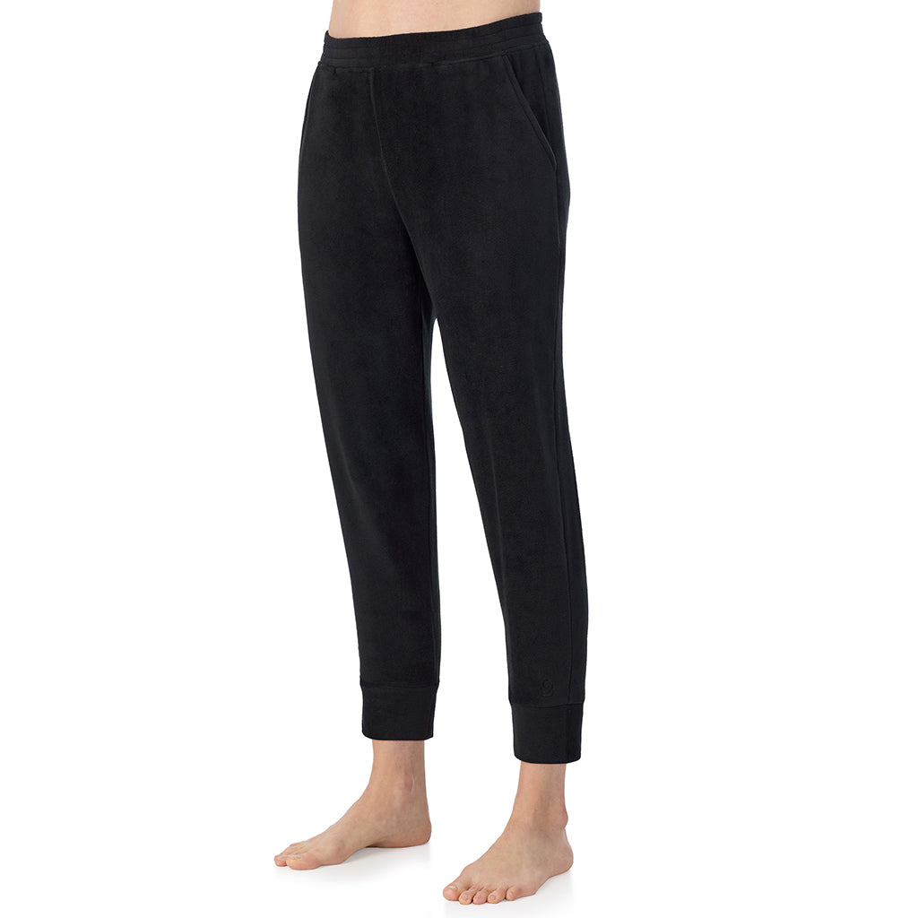 A lady wearing Black Cuddl Duds x Jennifer Lake Fleecewear with Stretch Cropped Jogger 