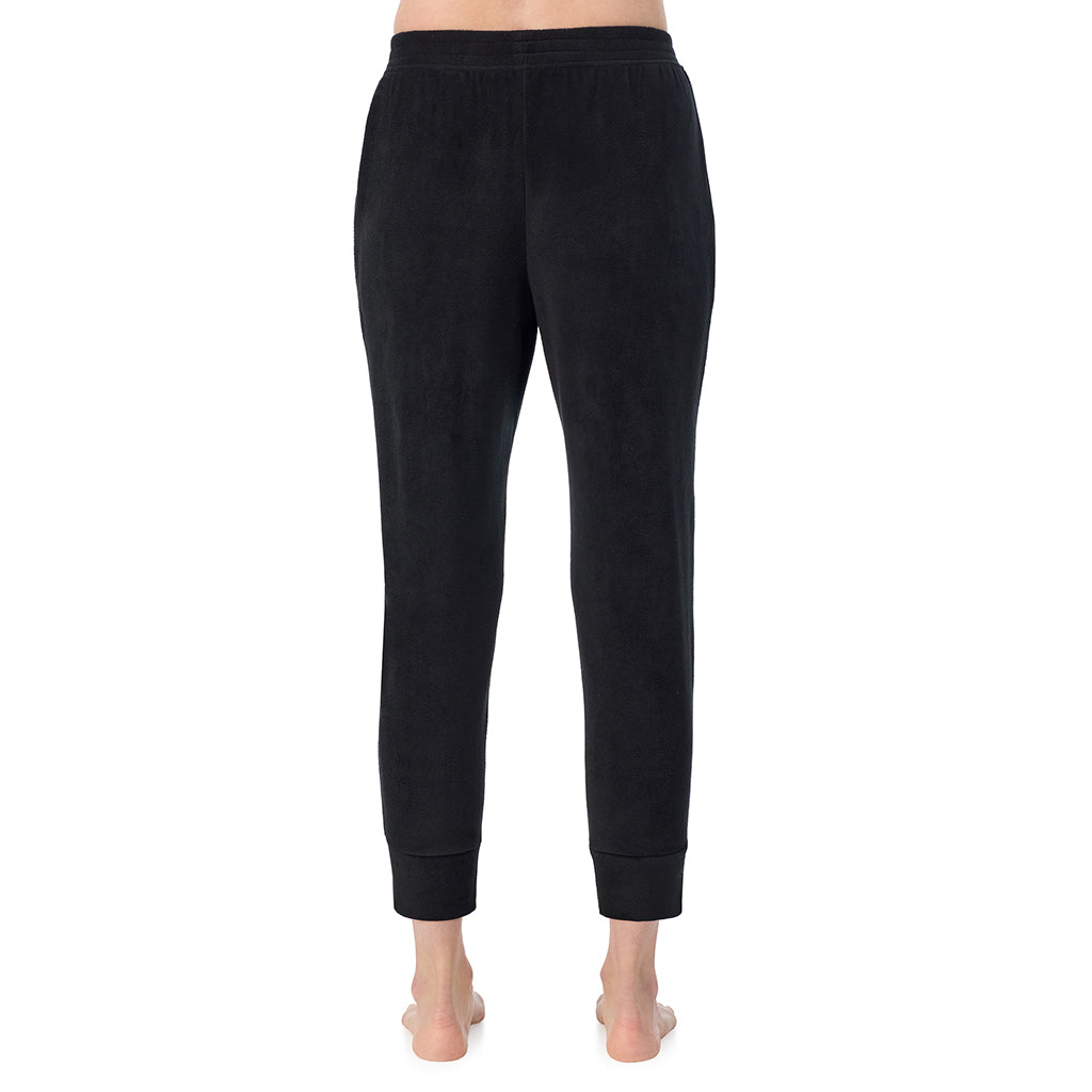 A lady wearing Black Cuddl Duds x Jennifer Lake Fleecewear with Stretch Cropped Jogger 