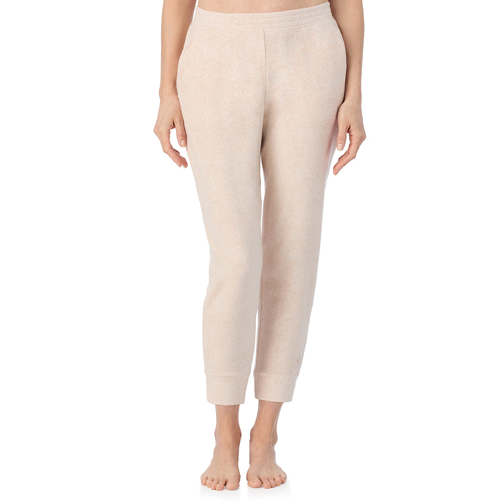 Oatmeal Heather; Model is wearing size S. She is 5'11", Bust 33", Waist 24", Hips 34".@A lady wearing Oatmeal Heather Cuddl Duds x Jennifer Lake Fleecewear with Stretch Cropped Jogger 