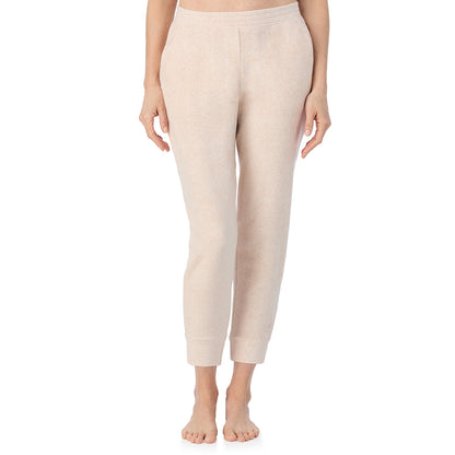 Oatmeal Heather; Model is wearing size S. She is 5'11", Bust 33", Waist 24", Hips 34".@A lady wearing Oatmeal Heather Cuddl Duds x Jennifer Lake Fleecewear with Stretch Cropped Jogger 
