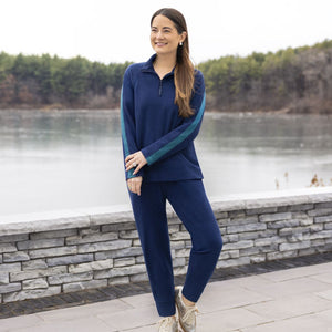 A lady wearing Navy Blazer Cuddl Duds x Jennifer Lake Fleecewear with Stretch Cropped Jogger 
