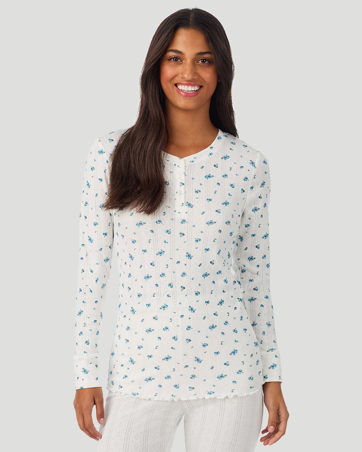 A lady is wearing Blue Ditsy Cotton Pointelle Long Sleeve Henley in a front view look
