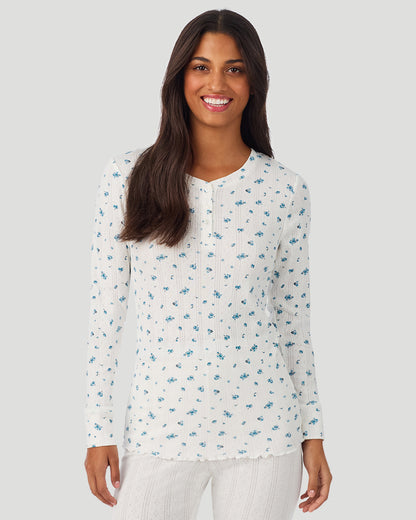 A lady is wearing Blue Ditsy Cotton Pointelle Long Sleeve Henley in a front view look
